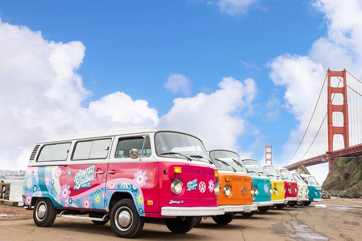 Experience the charm of San Francisco in vintage VW buses cruising past iconic landmarks like the Golden Gate Bridge while grooving to classic hits from the 60s and 70s.